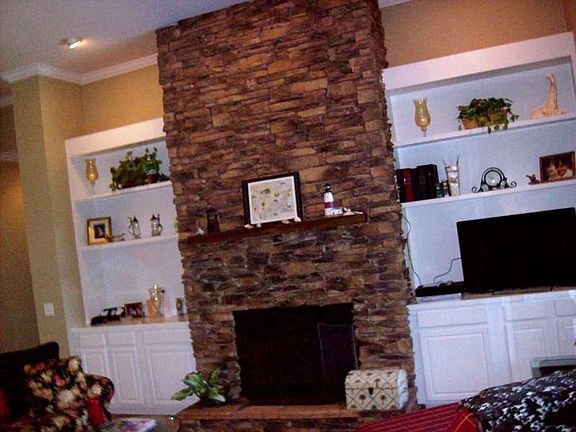 stone fireplace w/ built ins