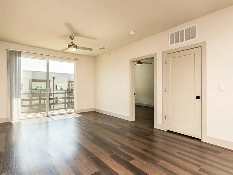 Living Room with Balcony and Hard Surface Flooring