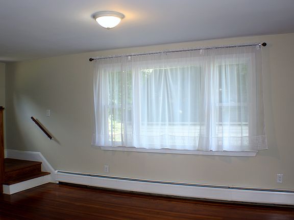 The living room window faces west to keep the room light and