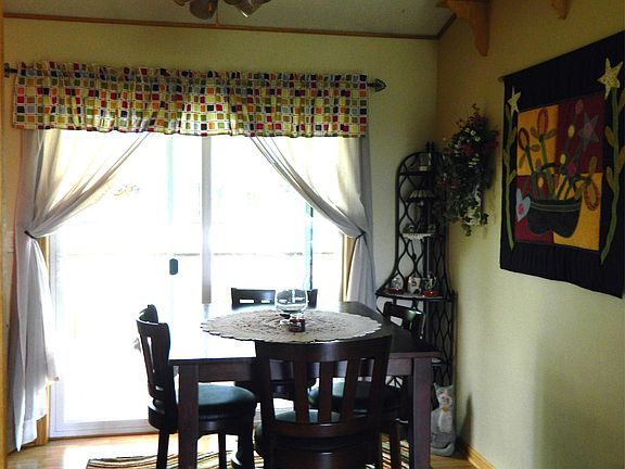 Great Dining Space opening to Deck & Pergola