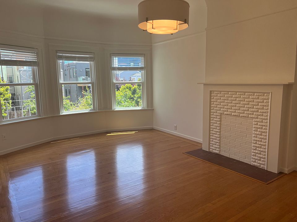 Large living room overlooking rear yard
