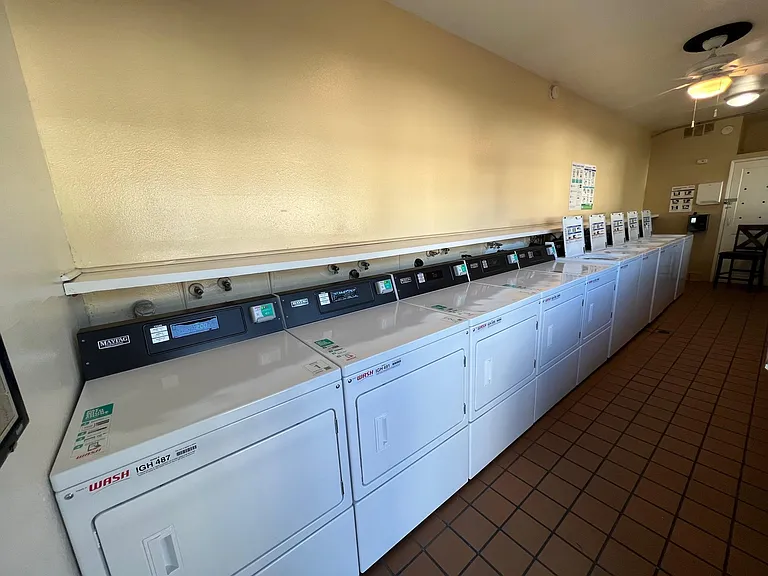 Laundry rooms have 5 washing machines, 5 dryers. Open 24 hours. Uses the Wash app. 2 laundry rooms on property.