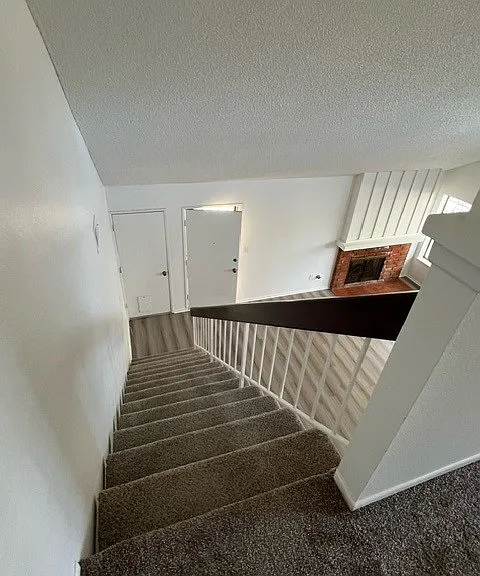 Looking down the stairs from upstairs