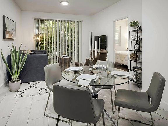 Living and Dining Areas That Connect to Balcony