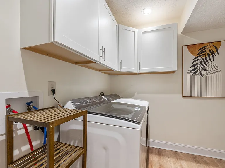 Laundry Room w/Washer/Dryer/built in cabinetry