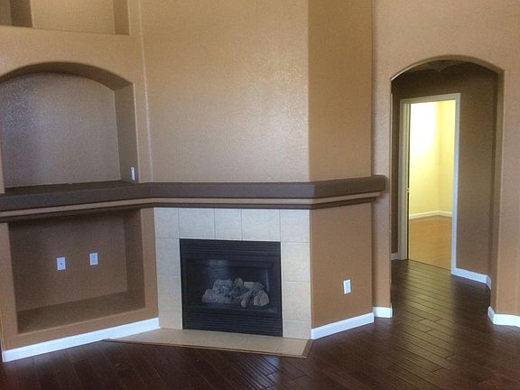 Living Room Fireplace, TV Nook, and Hallway