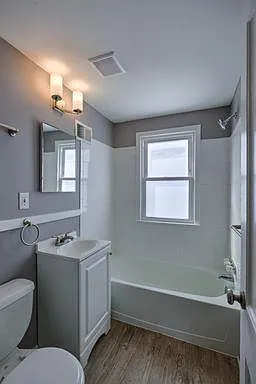 Bathroom witha white vanity at Colonial Park.