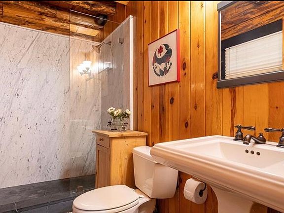Main bathroom now has new hardware. Second bath upstairs has sink, toilet, shower.