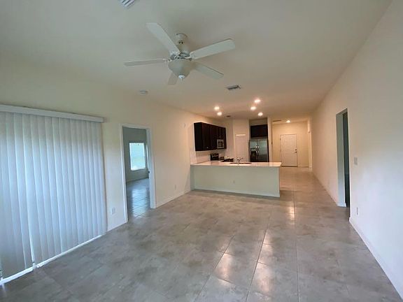 View of living space and master bedroom door to the left of the picture. The other bedrooms are to the right.
