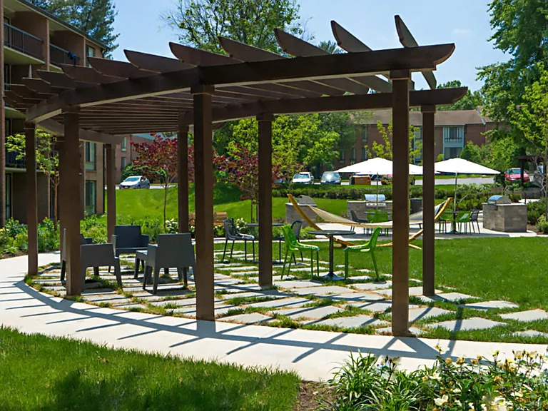 Exquisitely-Designed Courtyard with Pergola, Lounge Seating and Outdoor Hammocks
