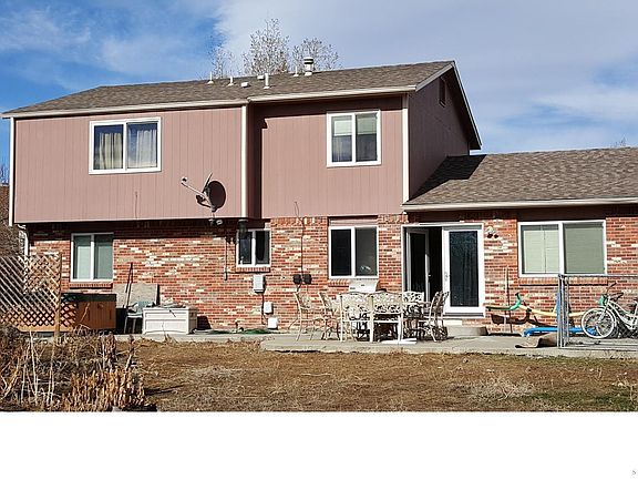 Back of home with plenty of room for a beautiful garden.