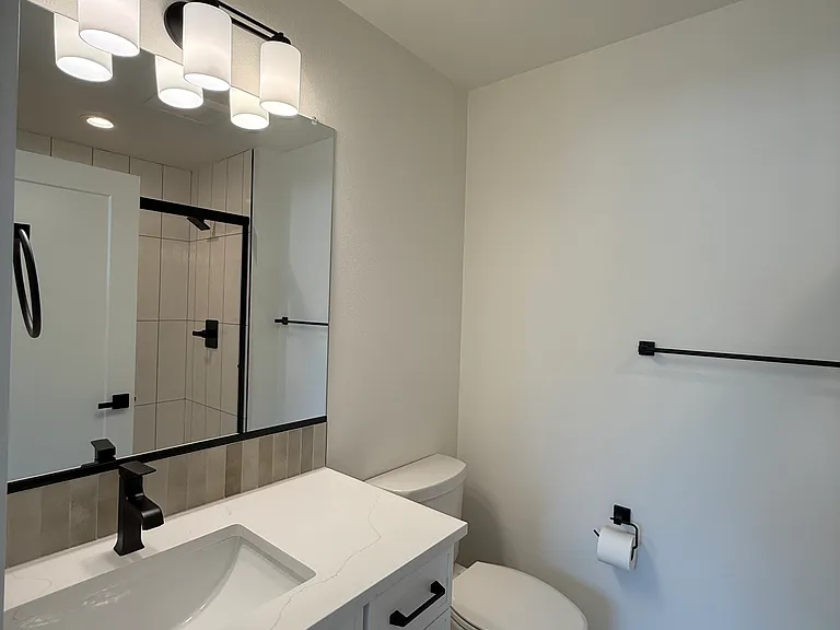 First primary suite bathroom.