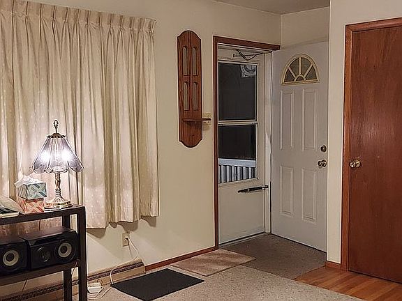 Living room with coat closet