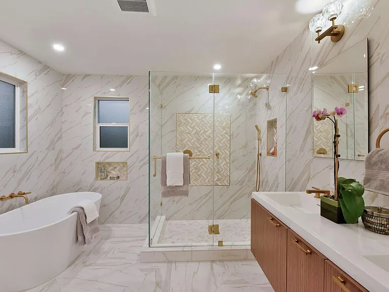 Ensuite bath with a soaking tub in the primary suite