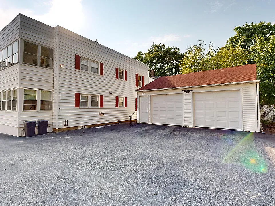 Backside of building, with garage