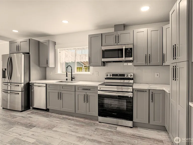 9402 Portland Ave E — Photo 1