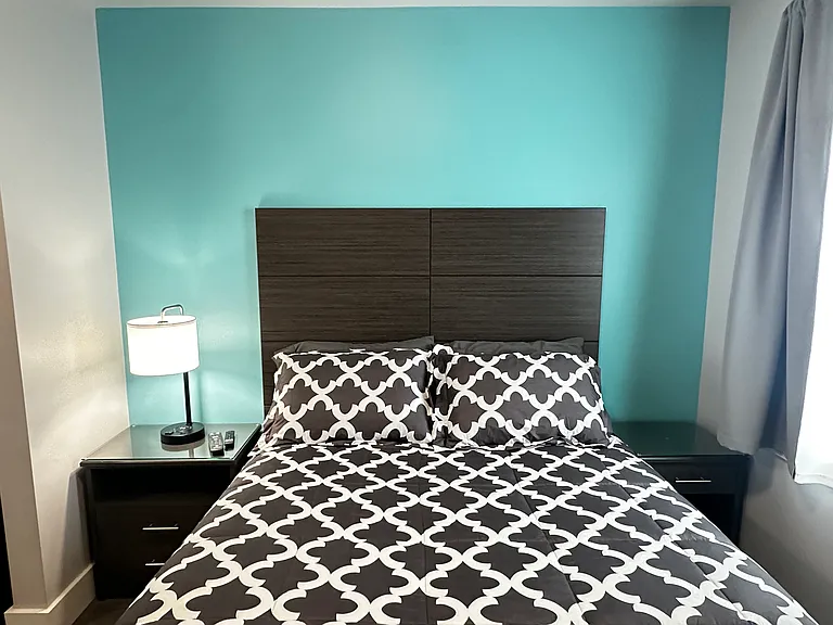 -Queen size bed - 4 pillows, comforter, sheet set, mattress protector
-2 nightstands
-bedside lamp with wireless phone charging