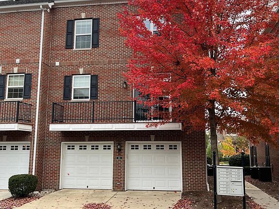 Back of townhouse with double garage