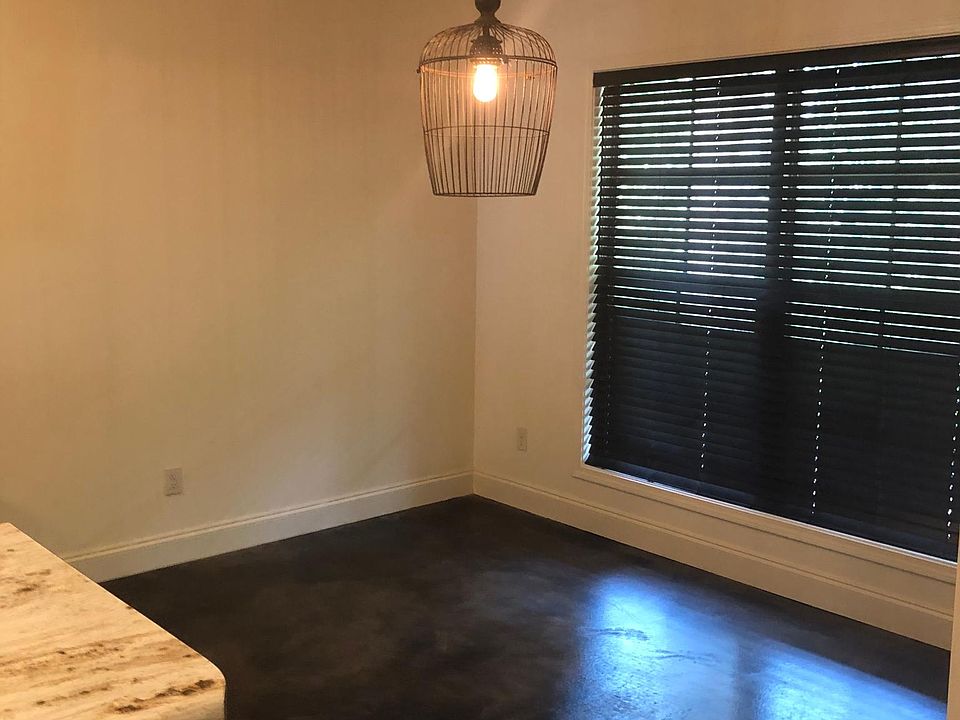 Large dining area over looking back yard.