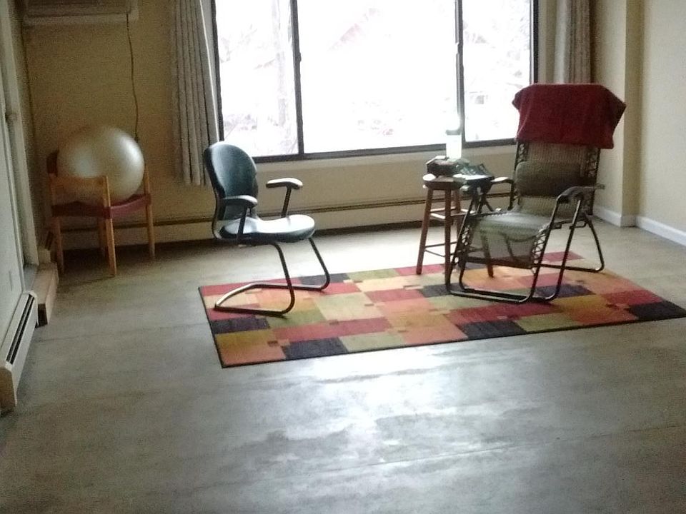 Large windows in bright and spacious Living Room.