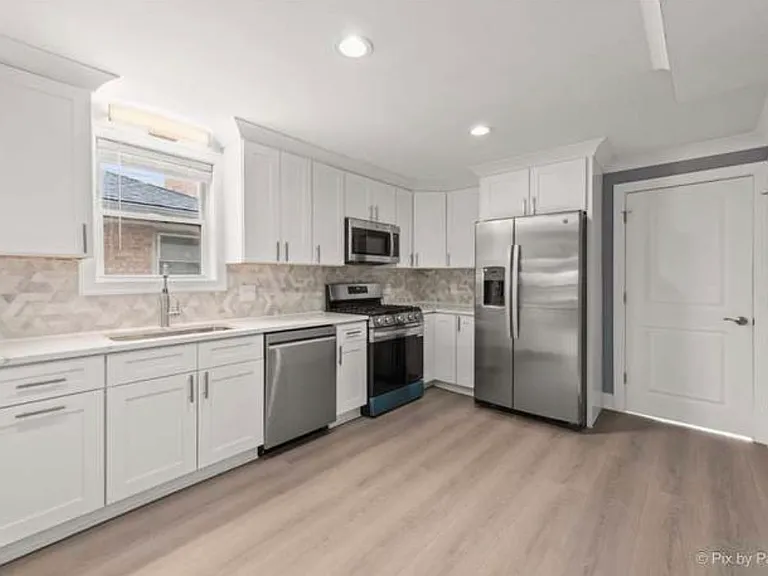 5252 N Mulligan Ave — Photo 16