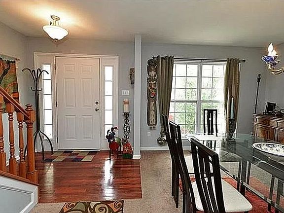 Front door and sitting room