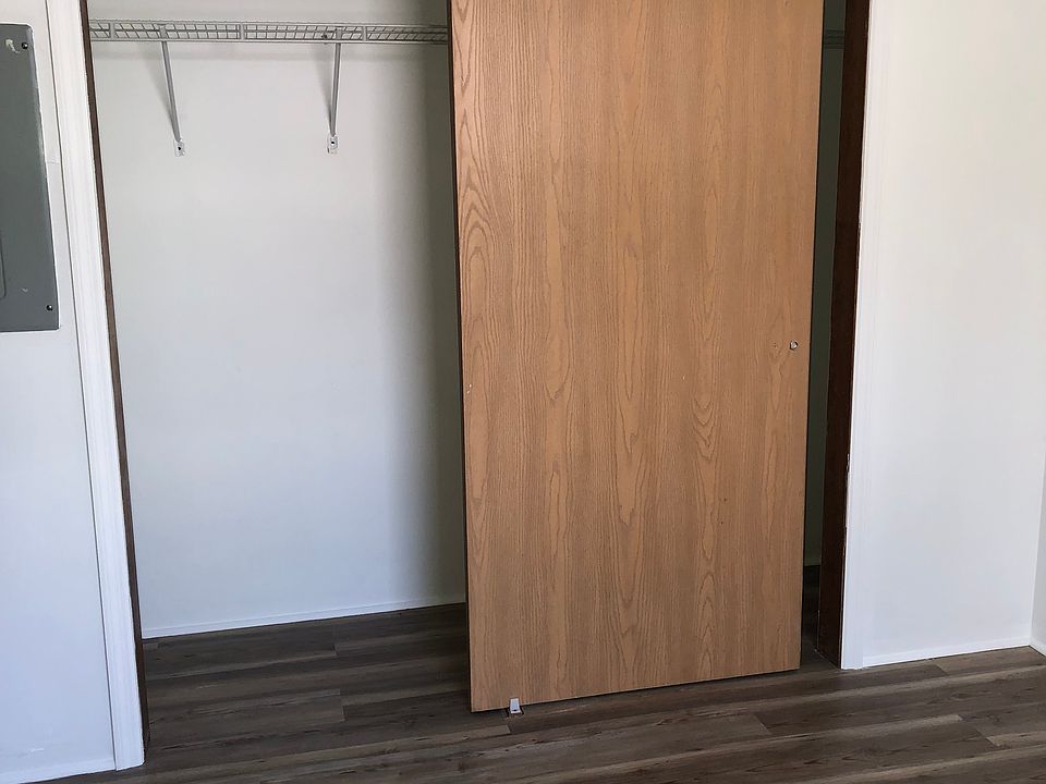 Bedroom with sliding closet doors