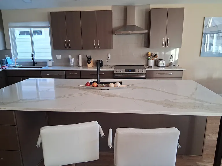 Brand new kitchen with bar seating area
