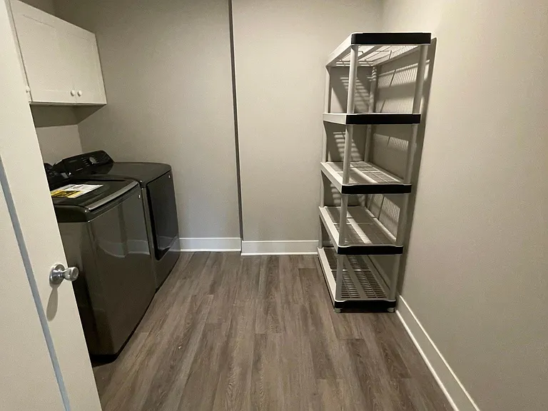 Large laundry room with extra room for shelving