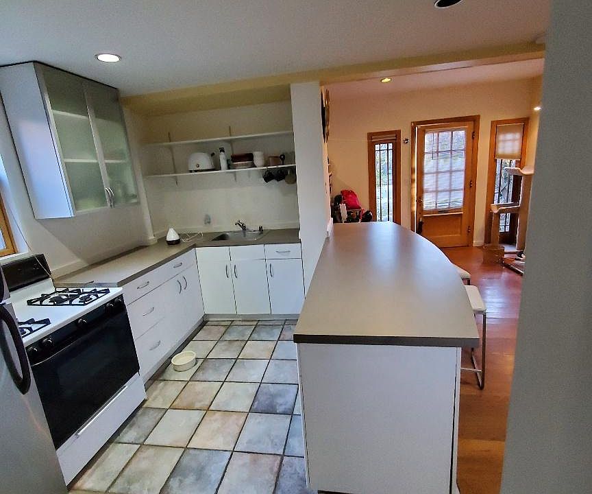 Copious Cabinets - Dishwasher, Disposal, Microwave, Refrigerator Quarry Tile flooring