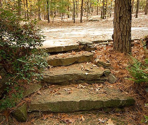 Stone steps from parking pad