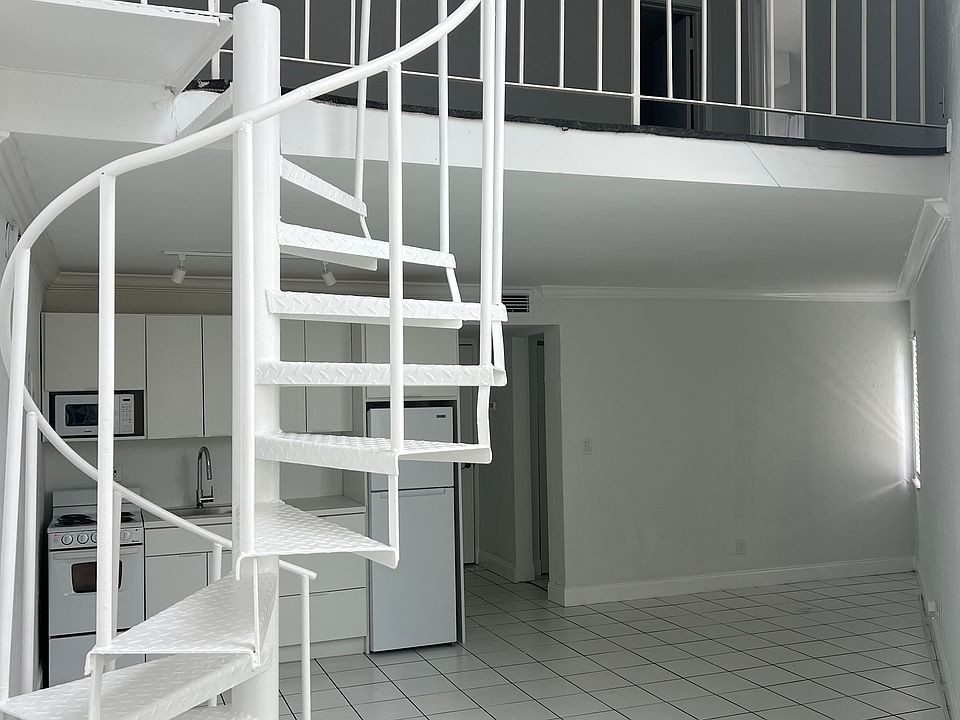 LIVING ROOM and staircase to Living Quarters