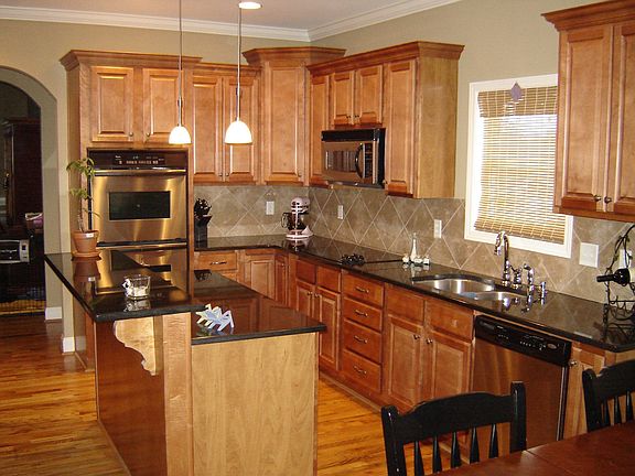 Great kitchen with stainless steel appl. and granite countertops.