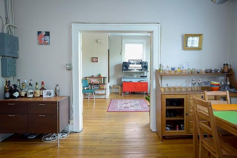 View of dining area facing west into west bedroom.