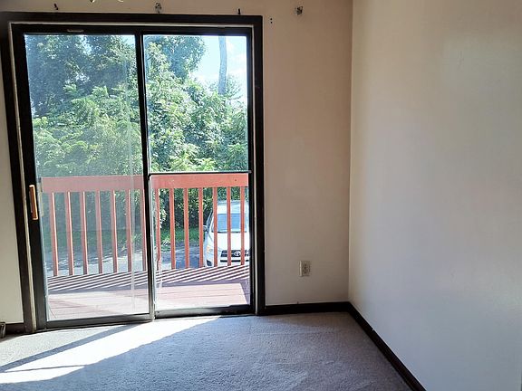 Livingroom adjacent to kitchen