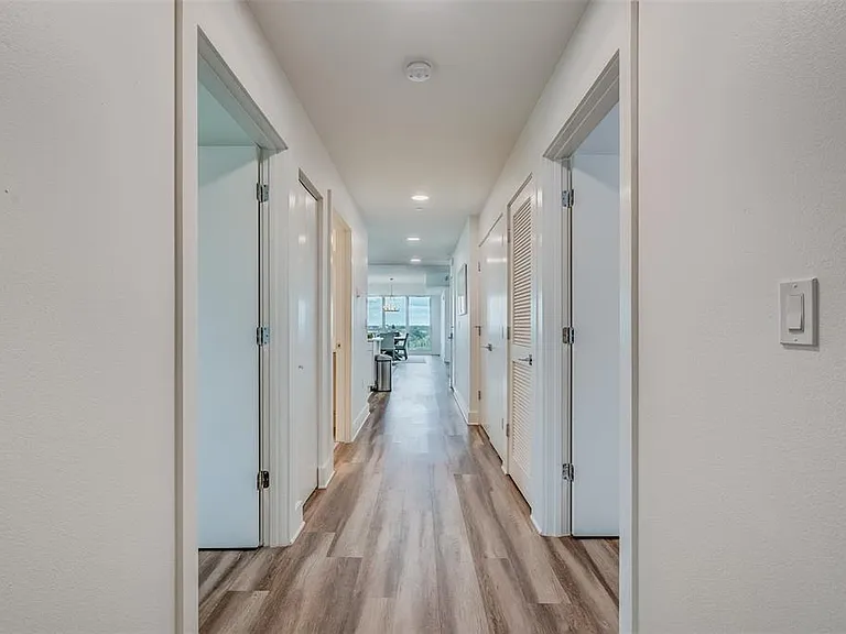 Hallway into the unit-wait till you see the views!