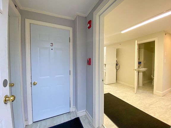 Unit 3. Common coin operated Laundry and half bathroom