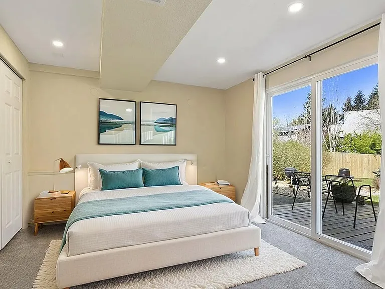 Available bedroom on the lower level - virtually staged.