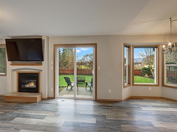 Snuggle up with a book in front of the cozy gas fireplace.