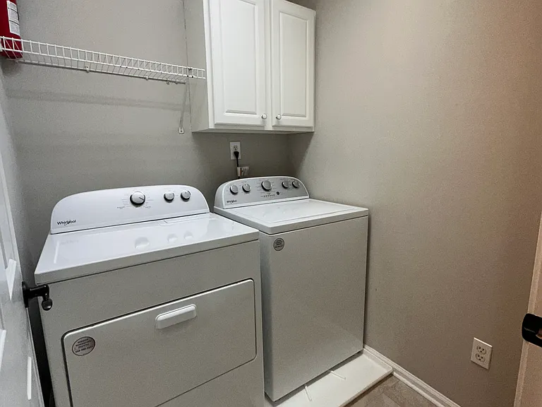 Upstairs Hall Laundry Room. New 2025 Washer and Dryer included in Rental.