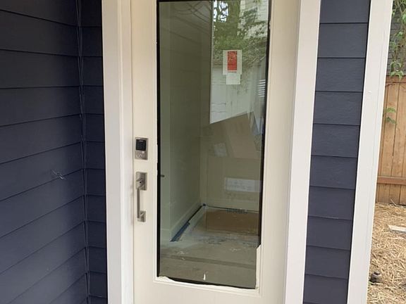 Full light entry door with Schlage electronic programable combination lockset.