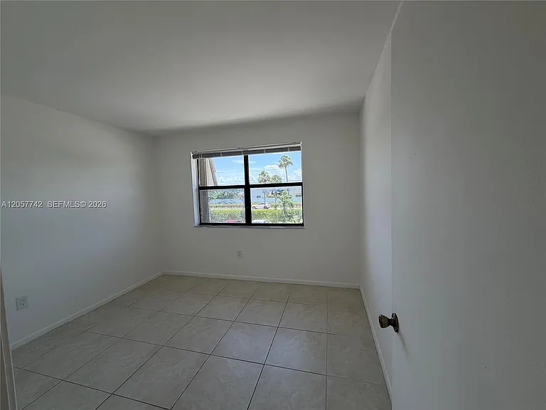 411 NW 100th Pl #201 — Photo 16