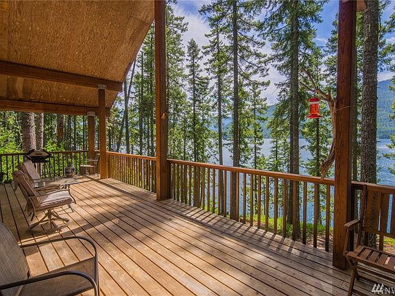 Huge covered deck is perfect for enjoying the lake views all year long!