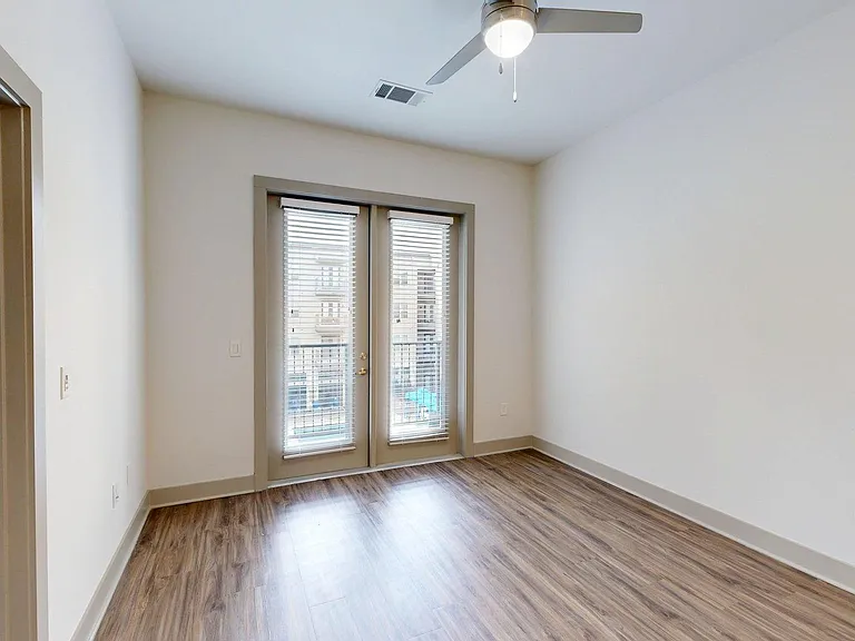 Living Room with Wood-Style Flooring and Patio/Balcony.