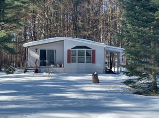 20257 W White Pine Dr, Marion, MI 49665