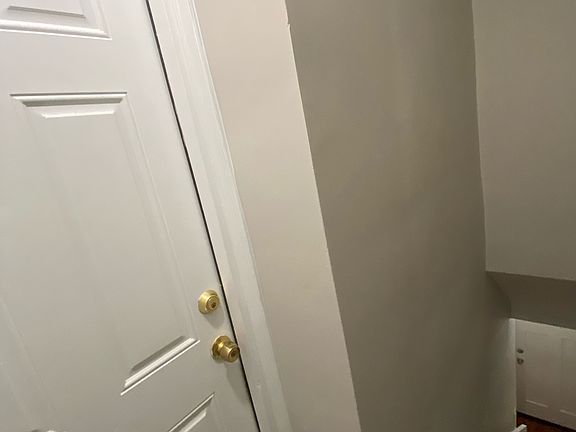 Stairway from front entrance to 2nd floor unit.