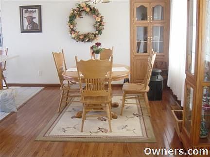 dining area with built in oak hutch