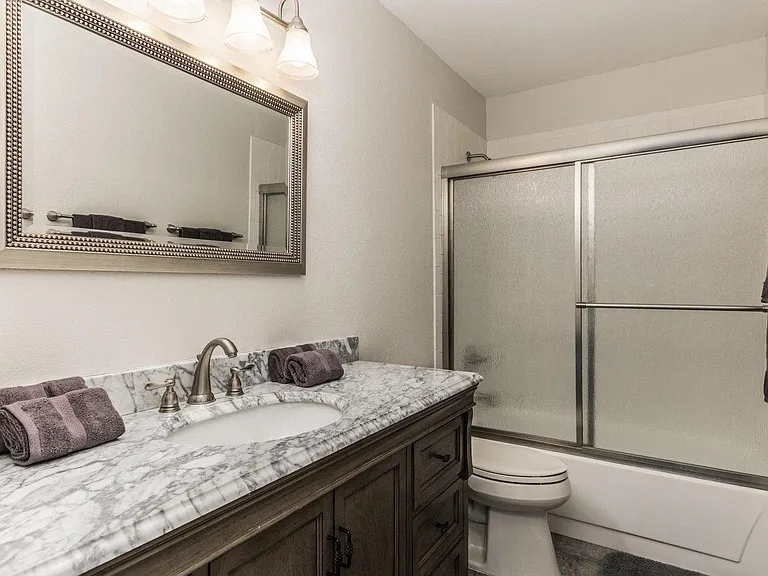 Bathroom #2 in the center of the hallway so very convenient for use with Bedrooms #2, #3, and #4.