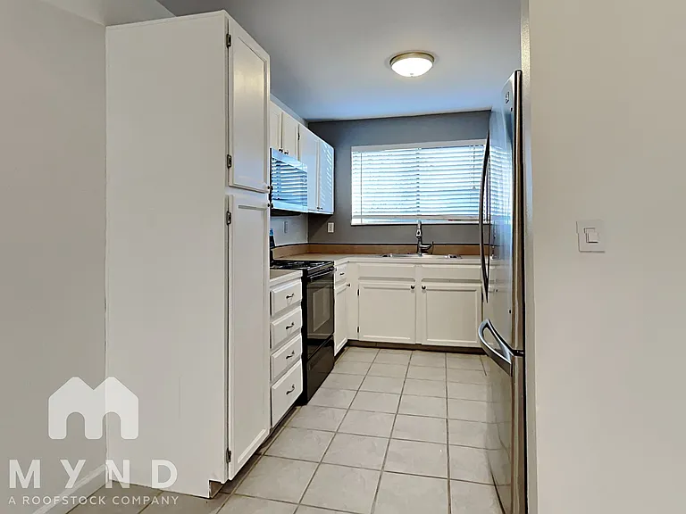 3656 S Depew St #101 — Photo 4