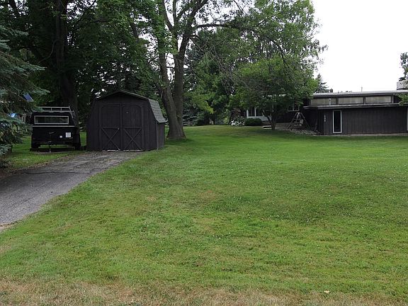 Shed w/ additional driveway